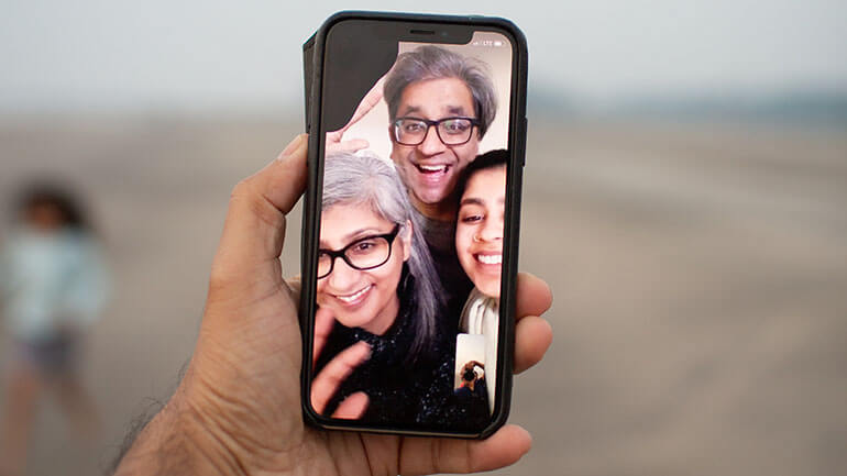 family on video call to celebrate graduation