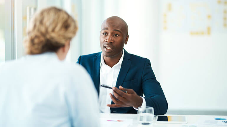 lawyer speaking to client